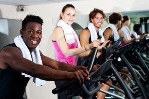 15440551-energetic-group-working-out-together-in-a-gym-on-elliptical